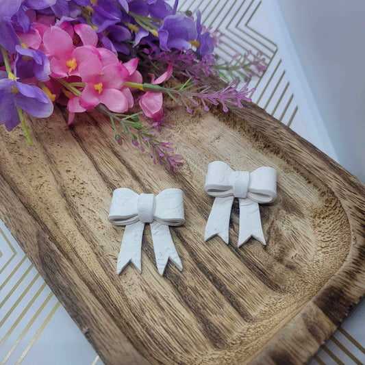 WHITE BOWS